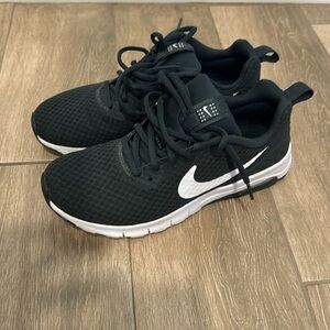 Hunter green Nike tennis shoes